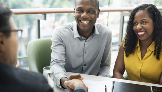 couple speaking with representative