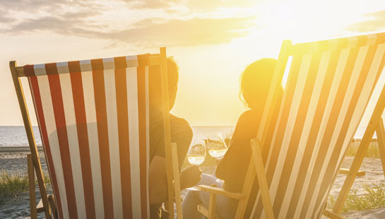 couple relaxing on beach