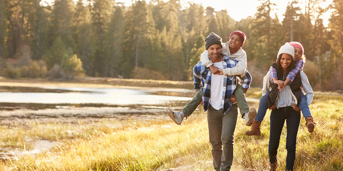 family walking in the field