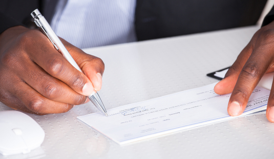 Human Hand Writing on Check